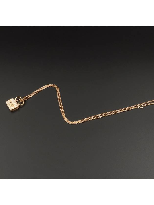 18K 750 yellow gold 0 29CT diamond Constance amulet pendant necklace H109615 - HERMES - BALAAN 8