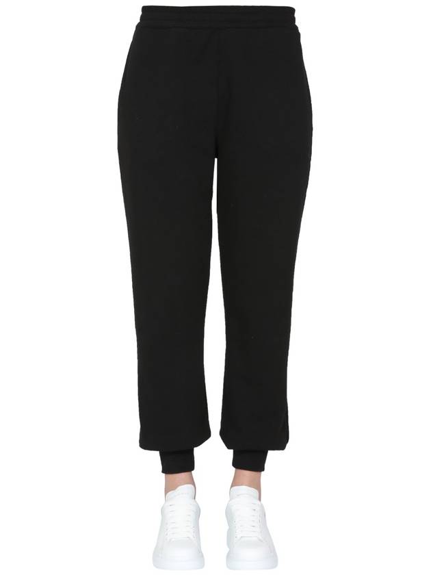 Women's White Graffiti Logo Jogger Pants Black - ALEXANDER MCQUEEN - BALAAN 2