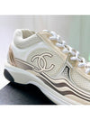 Women CC Logo Fabric Laminated Low Top Sneakers Silver Ivory - CHANEL - BALAAN 8