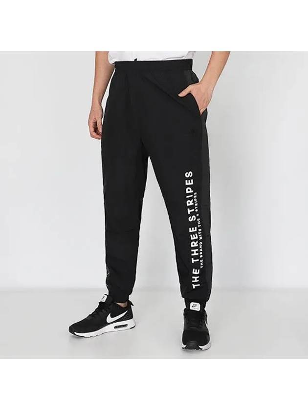 Wording Woven Track Pants Black - ADIDAS - BALAAN 2