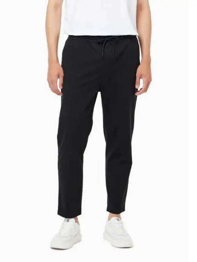 Jeans Essential Slim Drawcord Chino Track Pants Black - CALVIN KLEIN - BALAAN 1