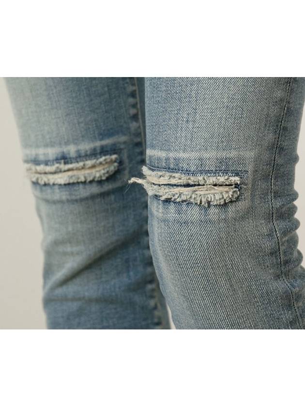 Knee Distressed denim - SAINT LAURENT - BALAAN 5