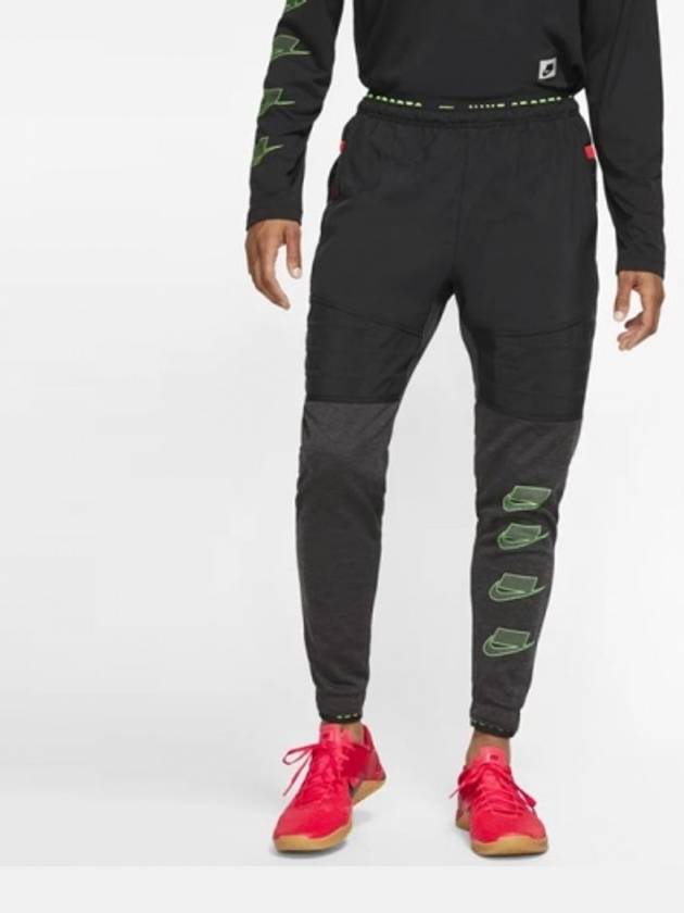 01 BV4523 010 Therma Over Branded Flex Crush Pants Black - NIKE - BALAAN 1