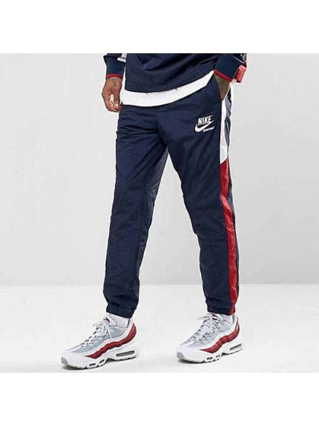 01 921745 451 Arcade Track Pants Navy Red White - NIKE - BALAAN 1