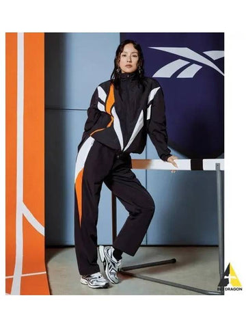 Hyori Lee wearing Vector Flash 2WAY warm up pants black - REEBOK - BALAAN 1