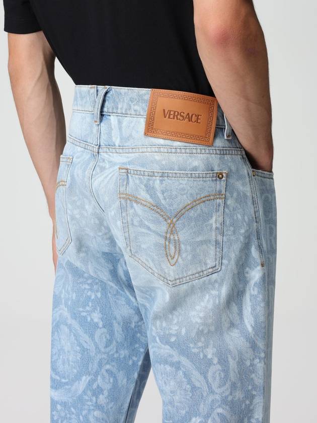 Jeans Versace in denim logato - VERSACE - BALAAN 5