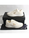 Triangle Logo Nappa Leather Low Top Sneakers Black Ivory - PRADA - BALAAN 7