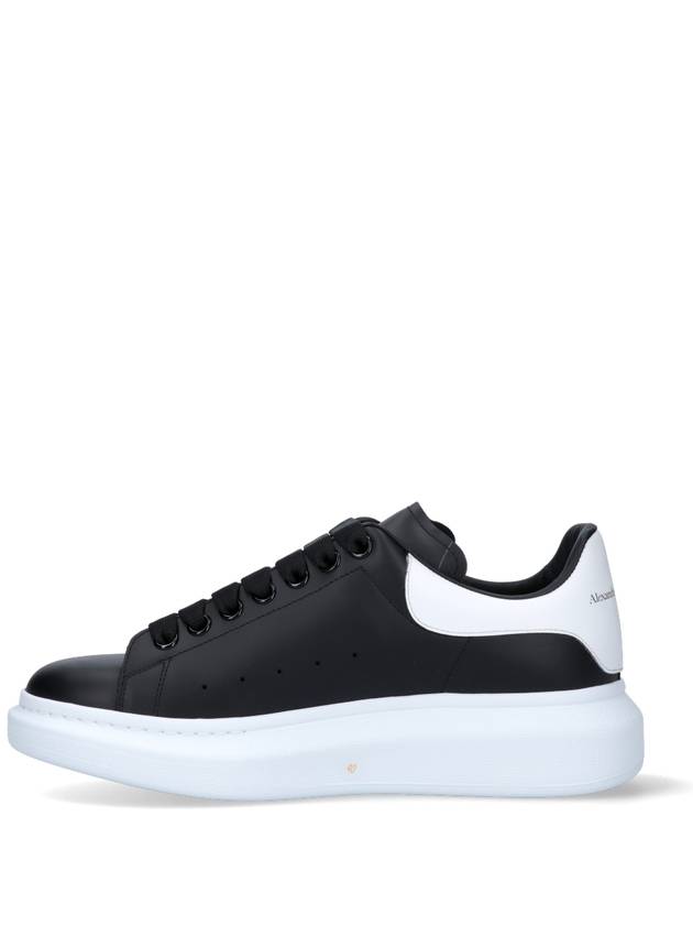 Oversized Leather Tab Low Top Sneakers Black - ALEXANDER MCQUEEN - BALAAN 4