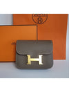 2023 Constance slim compact half wallet belt bag Etoffe gold women's wallet H082214 - HERMES - BALAAN 2