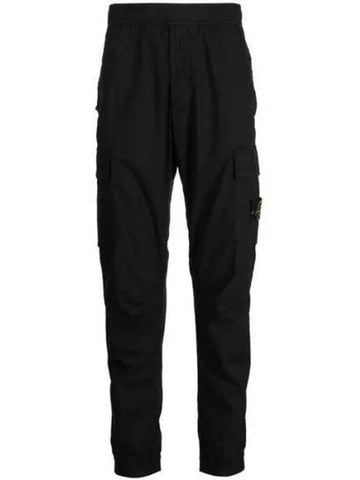 23SS 101531303 Wappen Patch Spandex Pants 101531303 1008595 - STONE ISLAND - BALAAN 1