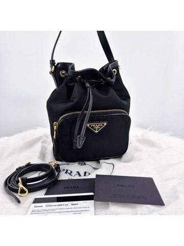 Tesuto triangle logo bucket bag black - PRADA - BALAAN 1