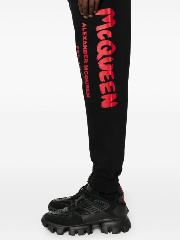 ALEXANDER MCQUEEN GRAFFITI PRINT JOGGERS - ALEXANDER MCQUEEN - BALAAN 5