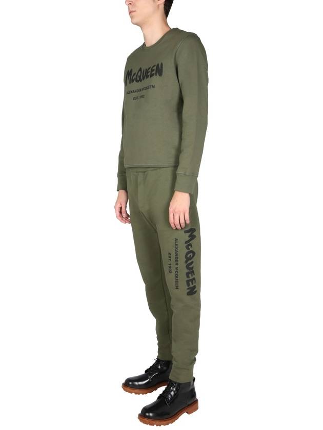 Side Black Graffiti Logo Jogger Pants Green - ALEXANDER MCQUEEN - BALAAN 3