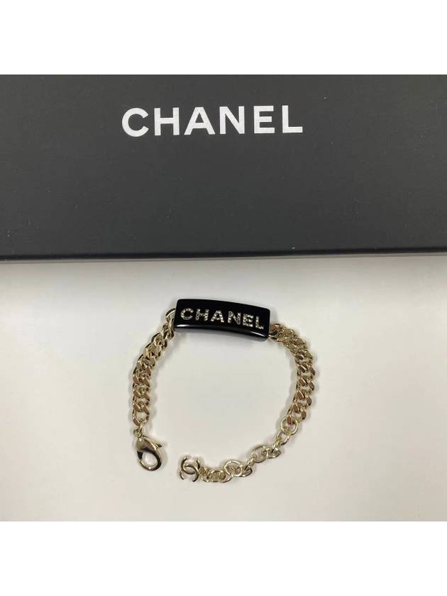 Lettering black gold bracelet AB9375 - CHANEL - BALAAN 7