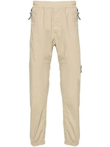 Logo Patch Tapered Cotton Track Pants Beige - STONE ISLAND - BALAAN 1