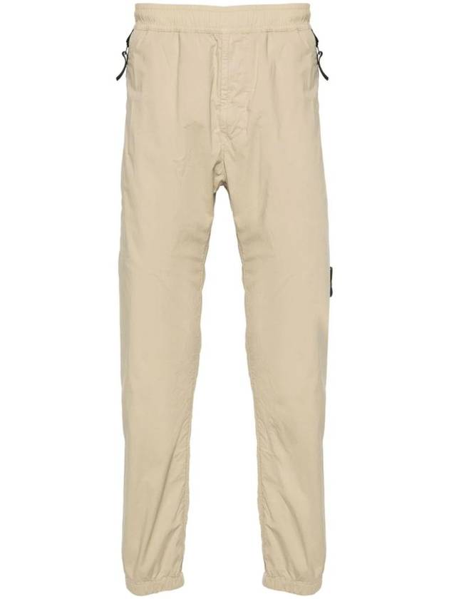 Logo Patch Tapered Cotton Track Pants Beige - STONE ISLAND - BALAAN 1