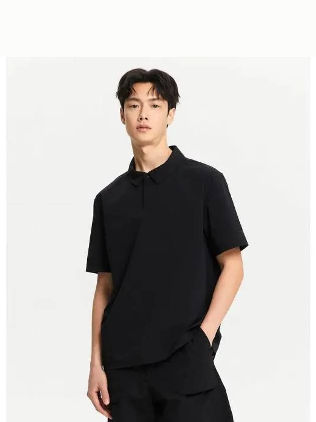 NBNFE32623 UNI FROZEN Woven Polo T shirt BLACK - NEW BALANCE - BALAAN 1