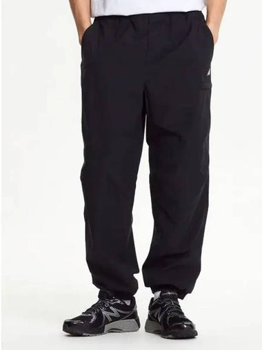 NBNTE31803 UNI ESS Warm up Jogger Pants BLACK - NEW BALANCE - BALAAN 1