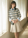 Minnie wearing FORMAL PLEATS SKIRT LIGHT GRAY - ANOETIC - BALAAN 2