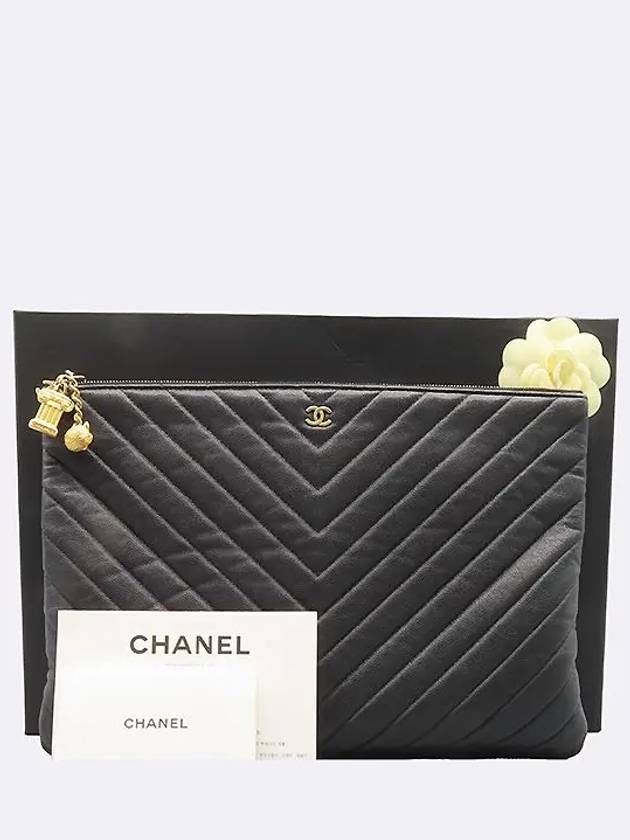 A82552 Gold COCO logo black caviar skin charm decoration clutch - CHANEL - BALAAN 1