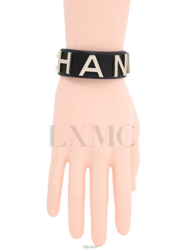 Gabrielle black gold logo leather bracelet bangle - CHANEL - BALAAN 7