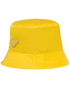 Re-Nylon Triangle Logo Bucket Hat Yellow - PRADA - BALAAN 1