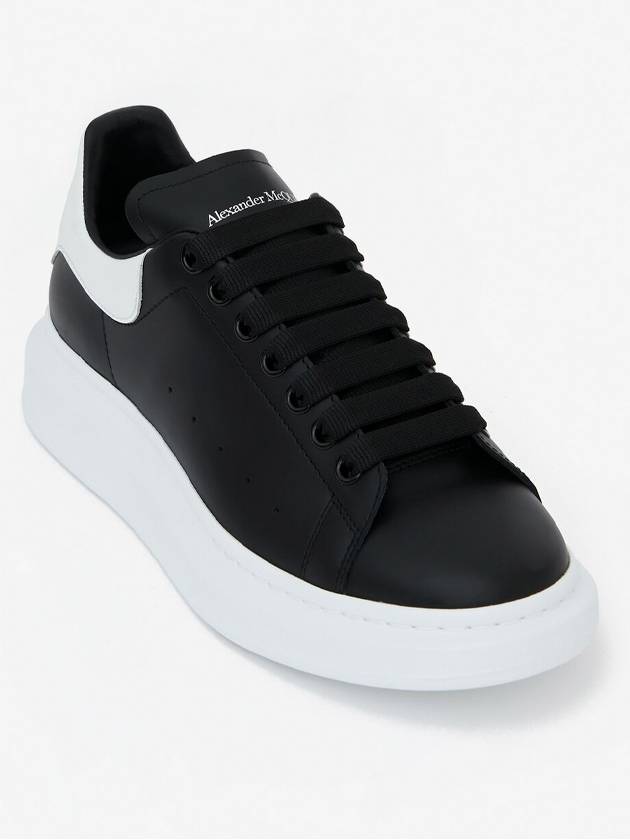 Oversized Leather Tab Low Top Sneakers Black - ALEXANDER MCQUEEN - BALAAN 4