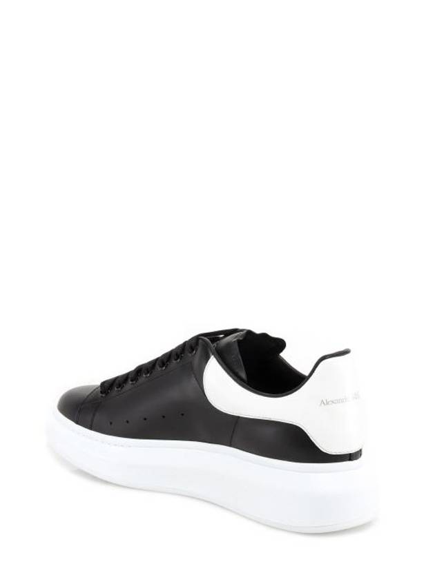 Oversized Leather Tab Low Top Sneakers Black - ALEXANDER MCQUEEN - BALAAN 7