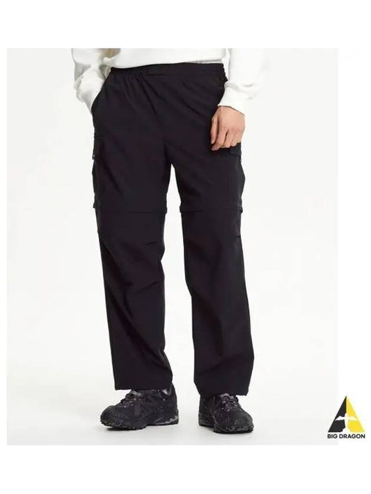 NBNTE4S101 MEN Ripstop Outdoor Woven Pants BLACK - NEW BALANCE - BALAAN 1