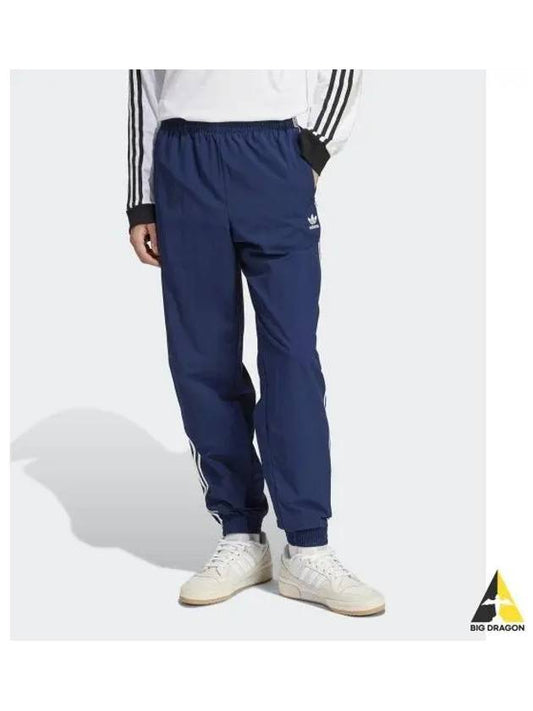 adidas Woven Firebird Track Pants Indigo IT2500 - ADIDAS - BALAAN 1