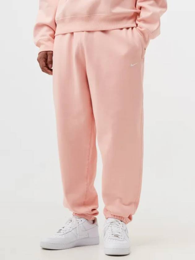 NRG Solo Swoosh Fleece Track Pants Bleached Coral - NIKE - BALAAN 4