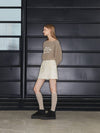 Minnie wearing ANC EMBROIDERY BOATNECK KNIT BROWN - ANOETIC - BALAAN 4