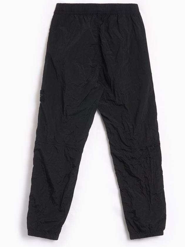 31019 Nylon Metal Econyl Track Pants Black - STONE ISLAND - BALAAN 3