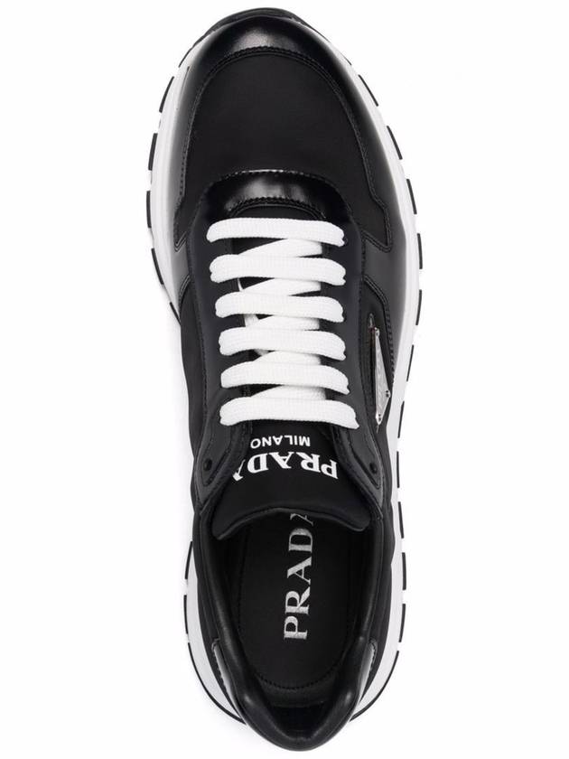 Re-Nylon Triangle-logo low-top sneakers - PRADA - BALAAN 4